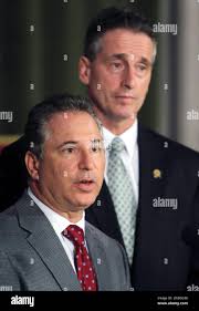 Director of State Operations Howard Glaser, left, speaks during a news  conference at the Capitol as Lt. Gov. Robert Duffy listens, in Albany,  N.Y.,