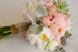 You will have a cheaper and easier time picking a flower that's in season. Wedding Flower Photos Island Sands Beach Weddings