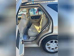 Image result for Gold Slate 2005 SRX