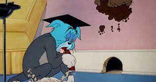What is the name of the black alley cat who smokes cigars, and makes friends and enemies with tom and jerry? Tralfaz Have A Cigar