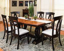 Clean, classic lines allow the woodgrain to shine through a rich colored stain. Dining Room Furniture Heartland Amish Furniture