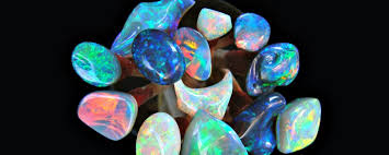 Black opals, boulders, cat's eye, fire opal, opal doublet in all possible shapes & colors. Opal Australian Opal Centre