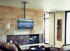 Pin By Glenn Fitz On Home Tv Over Fireplace Tv Hanging From Ceiling Tv Ceiling Mount