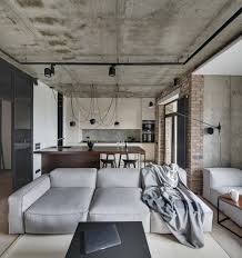Living Room And A Kitchen Zone In A Loft Style With Concrete And Brick Walls Living Room Loft Minimalist Living Room Loft Interiors