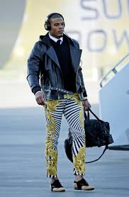 Cameron jerrell newton is an american football quarterback for the new england patriots of the national football league. Cam Newton S Super Bowl 50 Style Evolution In Versace Vogue