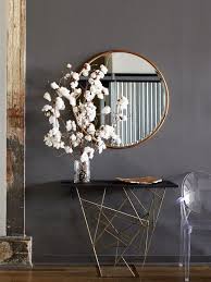 Black And Gold Round Wall Mirror Farmhouse Decor Large Round Mirror Entry Way Table Dark Grey Walls Gold Accents Hardwood Floor Ad Fa Modern Interior Design Modern Interior Modern Loft