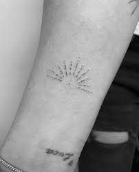Selena Gomez Just Debuted A New Dainty Collarbone Tattoo Small Tattoos Cool Small Tattoos Sun Tattoo