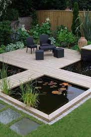 Mini Patio Koi Pond 39 Koi Pond Designs Easy Landscape Ideas At Backyardcom Com Backyardcom Landscaping Garden Pond Design Ponds Backyard Minimalist Garden