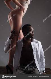 Interracial couple sex. Passionately embracing. Sexy love. Erotic and  desire. Stock Photo by ©Tverdohlib.com 451238010