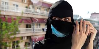 This outer garment called burqa envelopes around a woman. Eine Corona Maske Ist Kein Niqab Emma