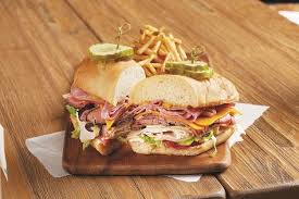 Bj S Mini Deep Dish Pizza The Triple Decker This Sandwich Has Character Sliced Turkey Roast Beef Ham Cheddar And Swiss Cheese Tomato And Sandwiches Deep Dish Pizza Sliced Turkey