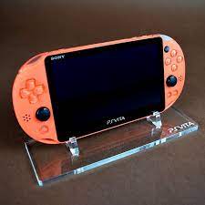 this neon orange ps vita slim was released in september 17th 2015 and was sold exclusively in japan the slim models ar ps vita portable console ps vita games