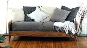 Because a metal daybed likely doesn't have a solid back, it probably wouldn't make a good sofa. How To Make A Daybed Look Like A Couch With Pictures