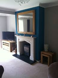 Pin By Sara Hawes On Living Room Feature Wall Living Room Blue Feature Wall Living Room Chimney Decor