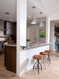 The half wall also creates the perfect corner to accommodate extra appliances like the oven. Open Concept Kitchen With Half Wall Ideas Small Kitchen Design Layout Small Kitchen Layouts Kitchen Design Small