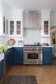 Two tone kitchen cabinets have become a trend that swept hundreds of homeowners off their feet. Trend We Re Loving Two Toned Kitchens Farmhouse Living Kitchen Remodel White Upper Cabinets Two Tone Kitchen