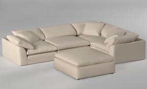 This living room furniture style offers versatile modular design, a plus if you enjoy rearranging your decor. Cloud Puff Slipcovered Modular L Shaped Sectional Sofa W Ottoman Color 391084 5 Piece Sunset Trading