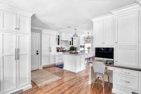 This small desk fits perfectly in the nook next to the refrigerator. White Cabinetry Archives Kountry Kraft