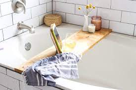 Our tray is 32 inches. A Quick And Simple Diy Wooden Bathtub Tray And Ipad Holder An Easy Modern Project That Will Look Amazing In Your B Diy Bathtub Bathtub Tray Bathtub Caddy Diy