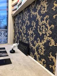 Black And Gold Wallpaper Living Room Ideas Versace Baroque And Roll Wallpaper In Black Navy Blue And Gold Living Room Design Decor Gold Wallpaper Bedroom Feature Wall Living Room