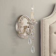 To illuminate and to save space. Tatiana 11 High Silver And Gold Wall Sconce 09738 Lamps Plus Gold Wall Sconce Wall Sconces Large Candle Wall Sconces