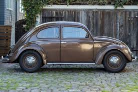 Image result for Ivory 1950 Beetle