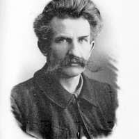 George Kessler. Formal seated portrait, subject facing front