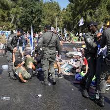 Israeli parliament takes first major step in Netanyahu's contentious  overhaul, deepening divisions