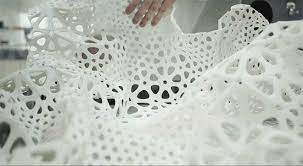 This Dress Is Made From 3 D Printed Plastic But Flows Like Fabric Prints 3d Printed Fabric 3d Printing Fashion