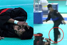 Mohd faizul nasir (left) going against filipino opponent, dines dumaan, in the subic bay exhibition and convention centre yesterday. M Sians Outraged As Silat Athlete Kicked In The Face After Falling Down At Sea Games News Rojak Daily