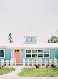 Little Turquoise Beach House With A Sweet Coral Door Beachcottagestylehomes Beach Cottage Exterior Beach House Colors Beach House Exterior