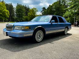 Image result for Ivory 1995 Town Car