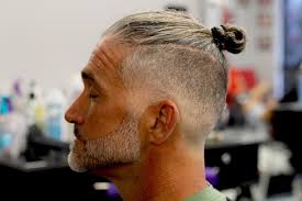 High top bald fade hairstyles are ideal for men with longer hair because it allows you to get a fresh new look while keeping your length intact. Man Bun With Bald Skin Fade With Beard Step By Step How To Youtube