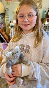 Adorable cat picture made with felting technique