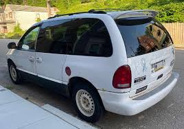 Image result for White 2000 Caravan