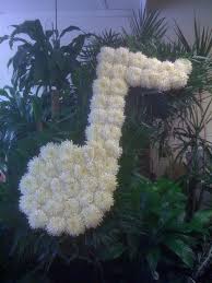 Mwah flowers will deliver flowers right to your door. Funeral Arrangement Music Note Funeral Floral Arrangements Funeral Flower Arrangements Funeral Flowers