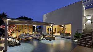 The signature front porch bridged the public yard and private interior of the bungalow, providing an extra room for the homeowner and a setting for neighbors to interact in the burgeoning suburbs. This 30 000 Square Feet Bungalow In Gujarat Is An Artist S Paradise Architectural Digest India