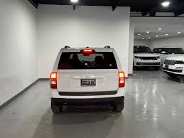 Image result for Bright White 2015 Patriot