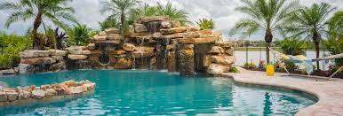 Lucas Lagoons Builds A Massive Luxury Custom Pool At The Concession In Bradenton Florida For Pro Golfer Jb Holmes Pool Insane Pools Pool Waterfall