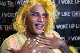 Trans Awareness Week: Queen Austin Empowers Black, Trans Visibility: Local  rapper, advocate