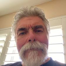 Bob Dylan” by Charles Bukowski these two young ones in the court across  from me they play Bob Dylan all day and all night