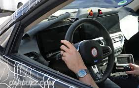 I doubt the interior space is any bigger than in a 3 series. Bmw S Tesla Fighter Will Have A Very High Tech Interior Carbuzz