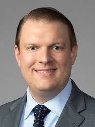 Kirk Watkins at Freeborn & Peters LLP