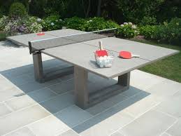 14 Ridiculously Chic Pieces To Glam Up Your Outdoor Space Outdoor Ping Pong Table Concrete Table Luxury Outdoor Furniture