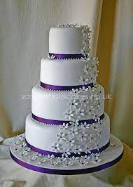 Wedding Cake Simple But Cute And It S Purple Lavender Wedding Cake Wedding Cakes With Flowers Wedding Cakes