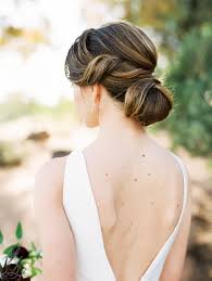 Bridal bun remains a top choice among brides for many generations. 20 Ways To Style Your Hair In A Low Bun On Your Wedding Day Martha Stewart Weddings