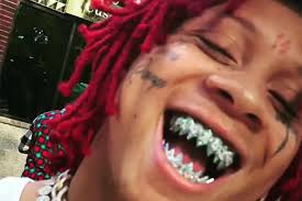 Lil uzi vert admits he could die from $24m diamond as blood seeps down his forehead. Trippie Redd Shows Off 50 000 Blue Diamond Fangs Grill Trippie Redd Rappers Grillz