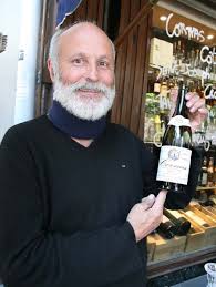 Thierry Allemand Holding A Bottle Of 2011 Cornas Reynard Vignerons Bottle Hold On