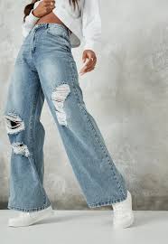 A structured blazer adds a cool polish to the relaxed denim. Blue Ripped Wide Leg Jeans Missguided
