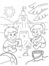 A child is building a sandcastle while a dolphin is jumping in the background. Fun At The Beach Coloring Page Crayola Com